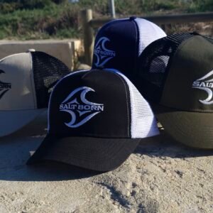 Salt Born trucker surf caps in multiple colourways on the beach